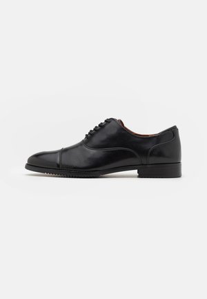 CARLISLE - Veterschoenen - black