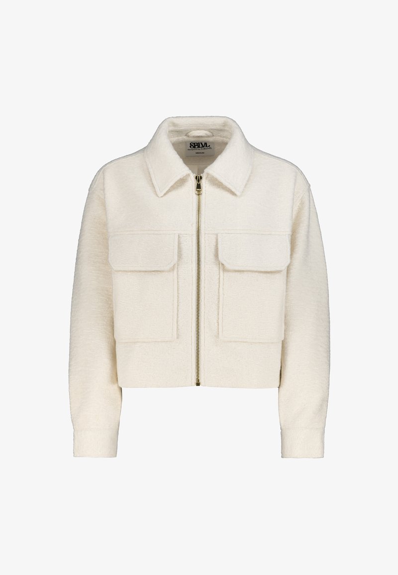 Cropped white jacket in textured fabric with a spread collar, front zipper, and two chest pockets. Features ribbed cuffs.
