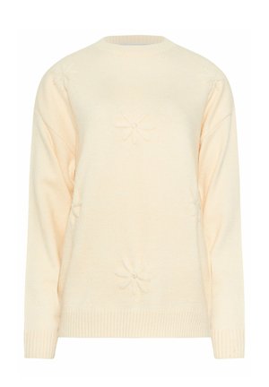 Suéter de punto color crema con mangas largas y sutiles patrones de flores en relieve en la parte delantera y los hombros.