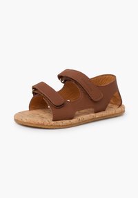 Sandali in pelle marrone con due cinturini regolabili in Velcro, suola in sughero e design traforato sui lati per la ventilazione. Testurizzati per una presa migliore.