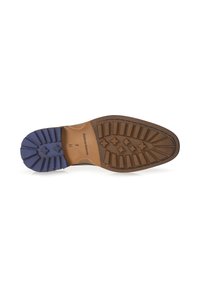 Sole di scarpa nera con una combinazione di gomma marrone e una sezione testurizzata blu. Presenta scanalature e impugnature a motivo per una maggiore aderenza.