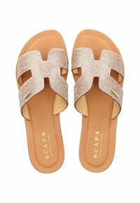 Rose gold slide sandals with sparkling textured crossover straps, beige insole, and gold branding. Flat sole designed for comfort.