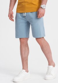 Ombre Teplákové kalhoty - light blue