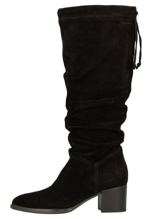 Botte en suède noire hauteur genou au design décontracté, avec un bout effilé et un talon bloc. Dotée d'un détail à cordon à la partie supérieure.