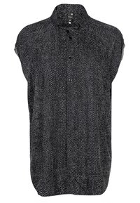 Chemise noire à manches courtes en tissu texturé et à motifs. Dotée d'une fermeture à boutons sur le devant et d'un col, avec une coupe décontractée.