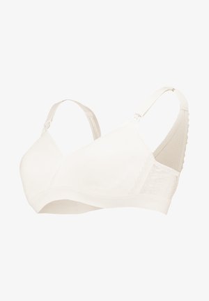 Soft white bra with seamless design, adjustable straps, and textured lace accents. Made of stretchy fabric for comfort.