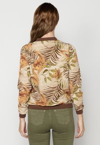 Koroshi Felpa con zip - beige