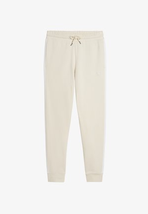 Beige joggingbroek met elastische tailleband, trekkoord, zijzakken, omgeslagen enkels en een subtiel logo op de linker dij.