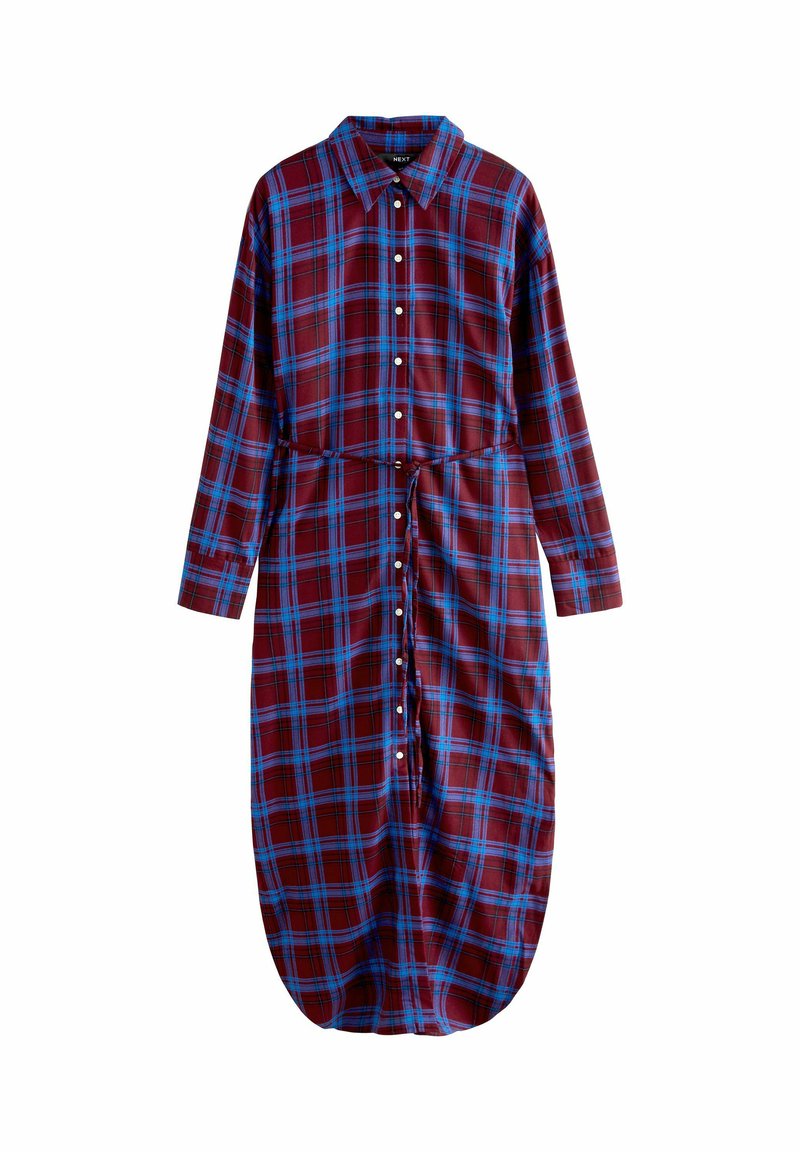 Vestido de camisa a cuadros en rojo y azul con cuello, mangas largas y detalle de cintura anudada. El dobladillo es redondeado y ligeramente más largo en la parte posterior.