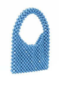 Borsa blu realizzata con perline sferiche, dotata di un manico arrotondato e di una superficie testurizzata. Il design ha un aspetto contemporaneo con una finitura lucida.