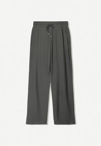 Mörkgrå vida byxor i en texturerad tyg, med en elastisk midja och dragsko samt två sidofickor.