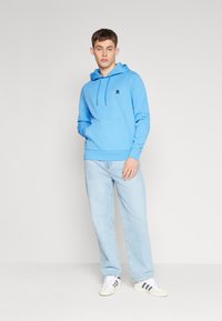 Tommy Hilfiger MONOGRAM HOODIE - Sweatshirt - blue spell