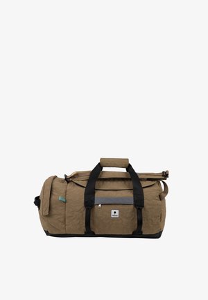 Sac de voyage matelassé marron avec poignées noires, une fermeture éclair supérieure, une poche latérale et une petite étiquette « Faguo » à l'avant.