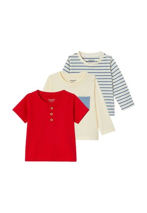 Three children's shirts: a red short-sleeve with buttons, a cream long-sleeve with a blue pocket, and a cream-blue striped long-sleeve.