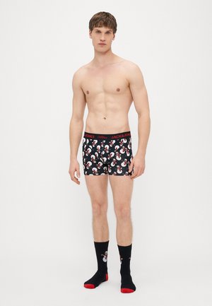 Schwarze Boxershorts mit festlichem Schneemannmuster, rotem Bund und passenden schwarzen Socken mit Schneemann-Design und roten Akzenten.