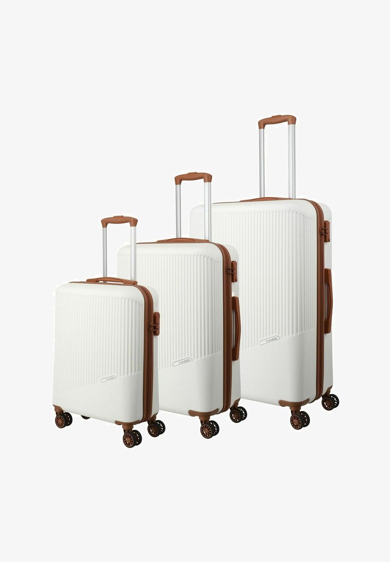 Three white hardshell suitcases with vertical ribbed texture, brown accents, retractable handles, and four spinner wheels.