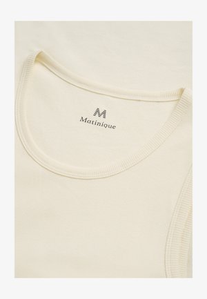 Krémový žebrovaný bezramínkový top s kulatým výstřihem a značkovou etikettou "Matinique" vytištěnou uvnitř límce.