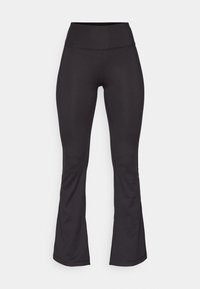 Fekete, bővülő leggings rugalmas anyagból. Magas derékkal, sima textúrával, testhez álló fazonnal, az alsó szegélyen pedig finom bővüléssel.