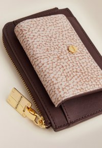 Brown leather wallet featuring a textured light brown flap with a gold snap and zip closure, adorned with gold hardware detail.