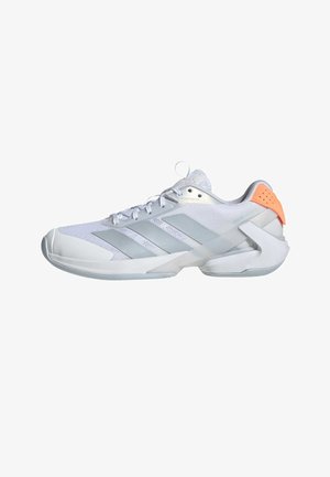 White athletic shoe with mesh upper, three silver stripes, and an orange accent heel. Features a rounded toe and contoured sole.