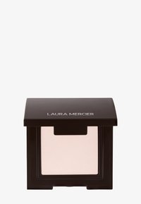 Laura Mercier presset pudderkompakt i svart innpakning med et klart vindu, som inneholder et lys beige pudder inni.