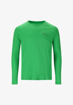 Långärmad skjorta i klargrön, gjord av texturerat tyg. Har rund halsringning och subtil svart linjeaccent på framsidan.