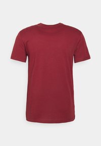 Lacoste T-shirt básica - cranberry