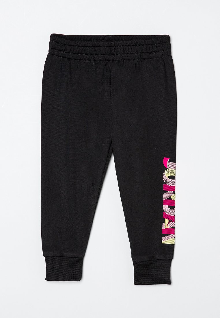 Pantalons de jogging noirs avec une taille et des poignets côtelés. Présente un texte coloré sur le côté en rose, jaune et blanc. Texture de tissu douce.