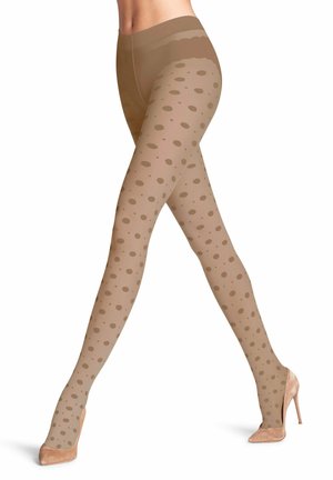 Collant a pois nudi con finitura trasparente, caratterizzati da motivi circolari color carne e una texture liscia, abbinati a tacchi alti beige.