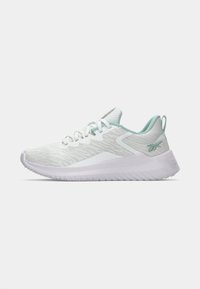 Athletic shoe featuring a light gray fabric upper with a textured design, mint green accents, and a white cushioned sole.