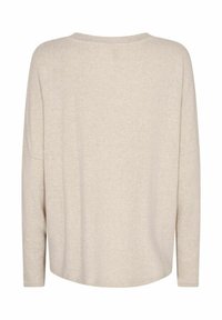 Beige long-sleeve top with a rounded neckline, soft texture, and a relaxed fit. Features dropped shoulders and a curved hem at the back.