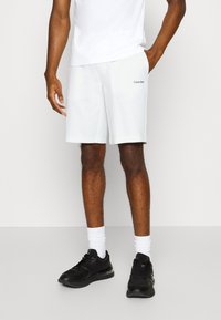 Calvin Klein MICRO LOGO REPREVE - Donji dijelovi trenirke - bright white