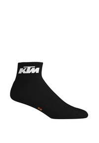 Chaussette noire jusqu'à la cheville avec bord côtelé, présentant le logo blanc "KTM" et l'indicateur de taille (43/46) en orange sur le côté. Texture lisse, design ajusté.