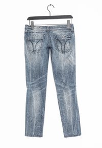 Slim-fit blå denimjeans med en urtvättad look. Har två bakfickor med dekorativ sömnad och en hängslinga i midjan.