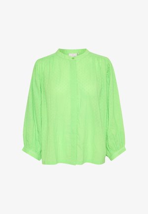 Blusa verde con un cuello alto, mangas largas abullonadas, patrón de lunares texturizados y una parte delantera con botones. Tejido suave con un corte holgado.