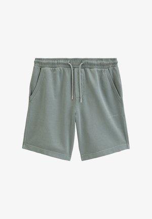 Shorts vert clair à cordon de serrage avec taille élastique, poches latérales, et petit logo « Marc O'Polo » sur la jambe droite.