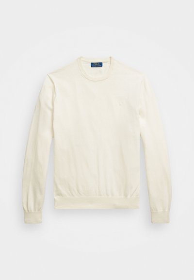 Roomwitte crewneck sweatshirt van zacht materiaal met lange mouwen, ribgebreide manchetten en een aansluitende tailleband. Klein logo op de voorkant.