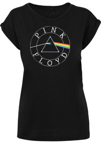 Black t-shirt featuring a round graphic with "PINK FLOYD," a triangle, and a rainbow stripe. The design is printed on soft fabric.