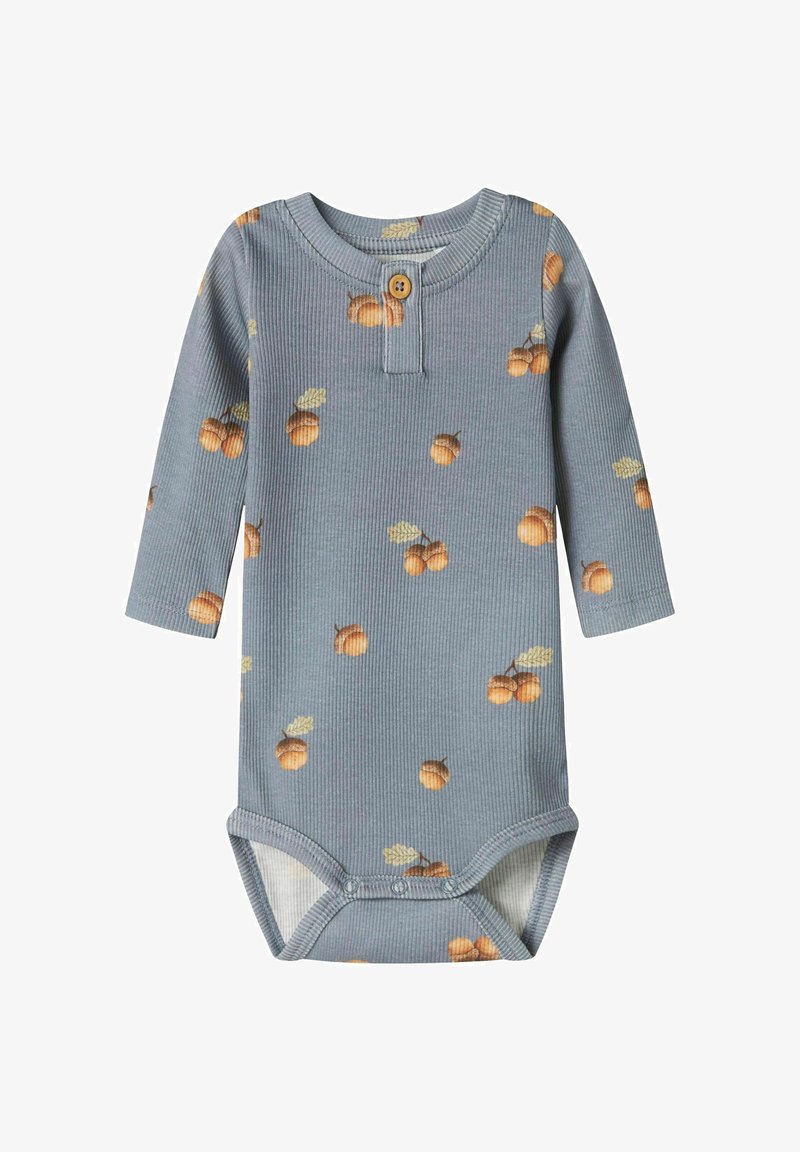 Body à manches longues pour bébé en tissu côtelé bleu clair avec des motifs de glands, doté d'un col boutonné et de fermetures à pression en bas.