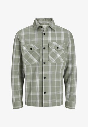 Grünes kariertes Hemd aus weichem Stoff, mit einer Knopfleiste vorne, zwei Brusttaschen und schwarzen Knöpfen. Mit weißen Linien akzentuiert.
