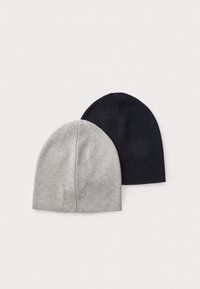 Two beanie hats: one in light grey and one in dark navy. Knitted texture, fitted design, and rounded top.