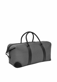 Bolsa de tela gris con asas y detalles en cuero negro, con la marca "CERRUTI 1881" en el lateral.