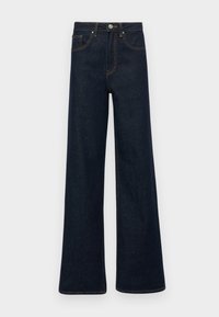 Jean en denim bleu foncé à jambes larges avec poches avant, fermeture à boutons et surpiqûres contrastées sur un fond clair uni.