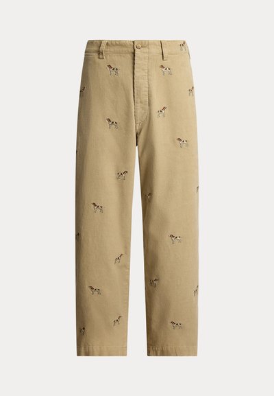 Pantaloni beige in velluto a coste con ricami di cani, taglio a gamba dritta, cinque tasche e chiusura frontale con bottone.