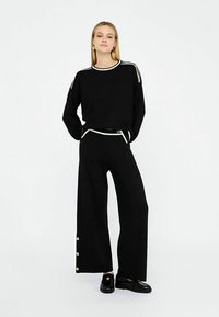 LIU JO KNITTED - Bukser - black