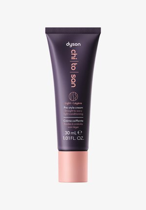 Dyson Chill to San Pre-Styling-Creme Tube, 30 ml, zur Pflege von glattem bis welligem, hellem Haar, lila mit rosa Deckel.