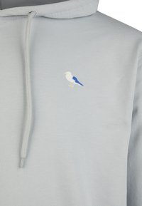 Light blue hoodie with a drawstring hood, featuring a small embroidered bird design in white and blue on the chest. Smooth texture.