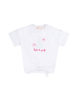 Maglietta bianca a maniche corte per bambini con nodo frontale, con una giraffa blu, due fiocchi rosa e la scritta "Sophie la girafe" in rosa.