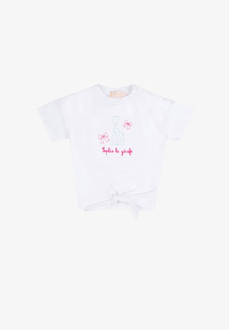 Maglietta bianca a maniche corte per bambini con nodo frontale, con una giraffa blu, due fiocchi rosa e la scritta "Sophie la girafe" in rosa.