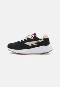 Black sneaker with beige accents, suede and mesh materials, white midsole, gum rubber outsole, features a prominent logo and red tab.